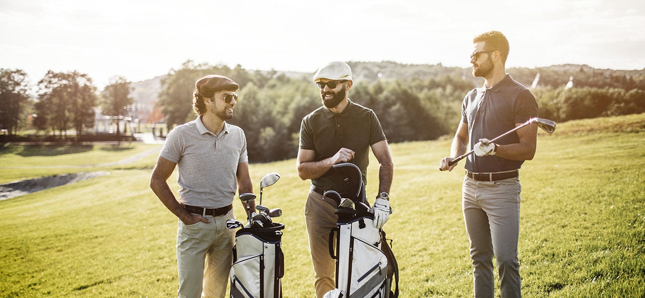 people talking on golf course