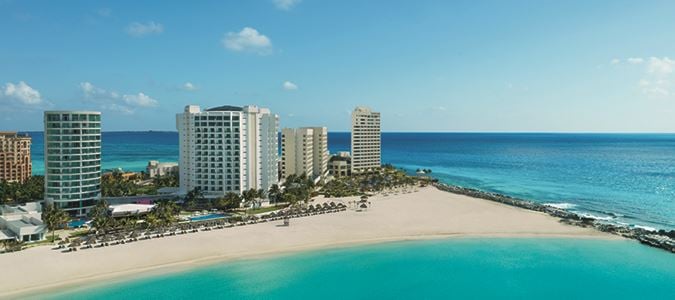 Aerial view of hotel next to the beach and ocean